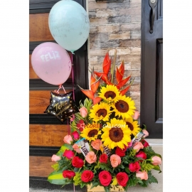 Arreglo rosas girasoles y chocolatinas 